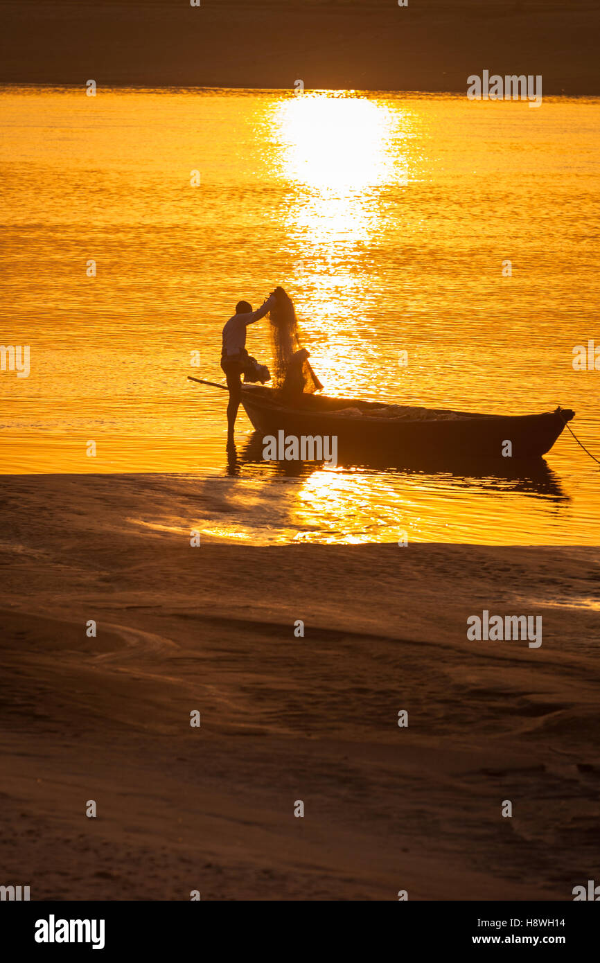 Boat pictured in sunset on the River Ganges, northern India Stock Photo