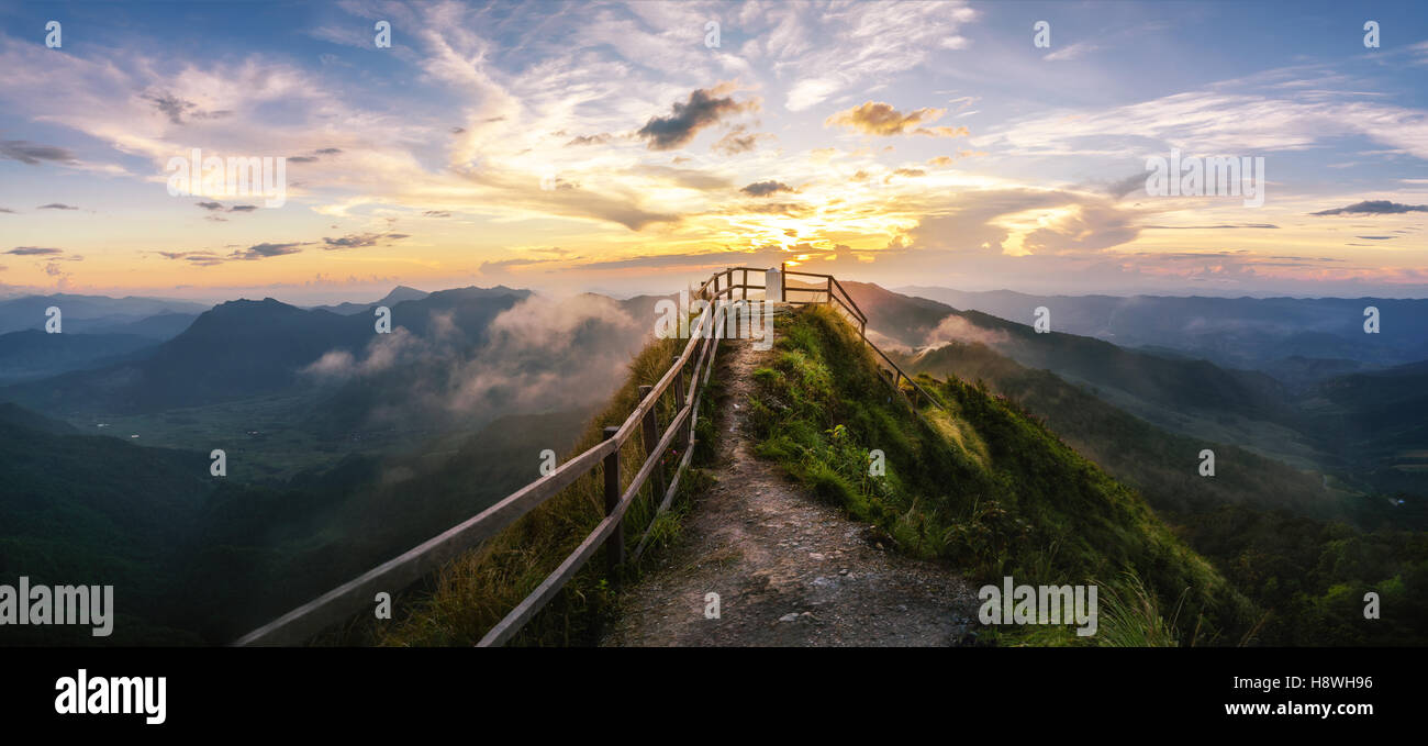 Sunset in the mountains landscape,Thailand mountain scenic,Phu Chi Dao Chiangmai Thailand,Dramatic sky panorama. Stock Photo