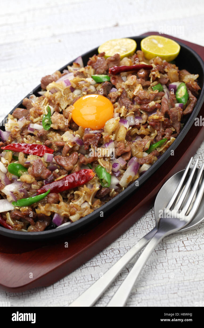 sizzling pork sisig, filipino cuisine Stock Photo