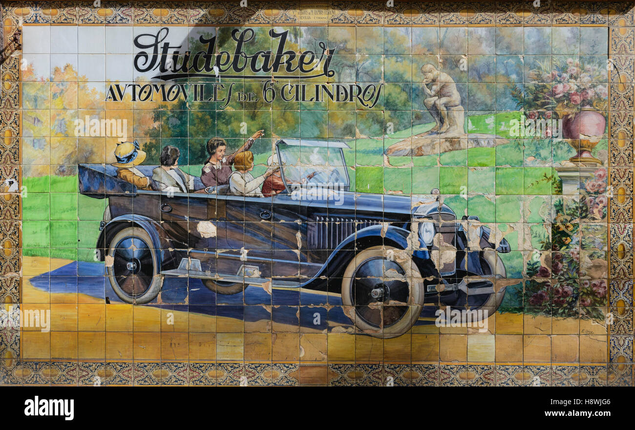 Azulejo wall advert from 1924 showing a Studebaker motor car, Calle Tetuan, Seville, Andalusia, Spain Stock Photo