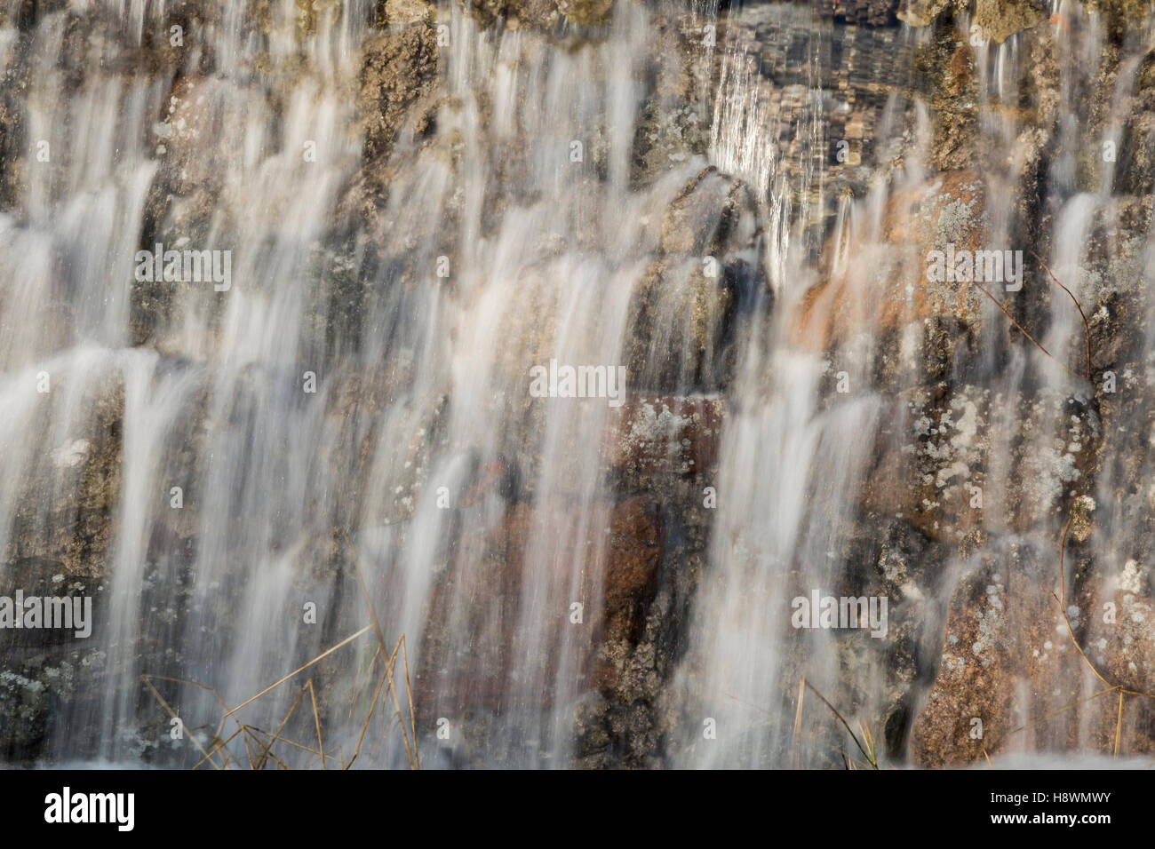 Water Pouring Down Rocks close up Stock Photo - Alamy