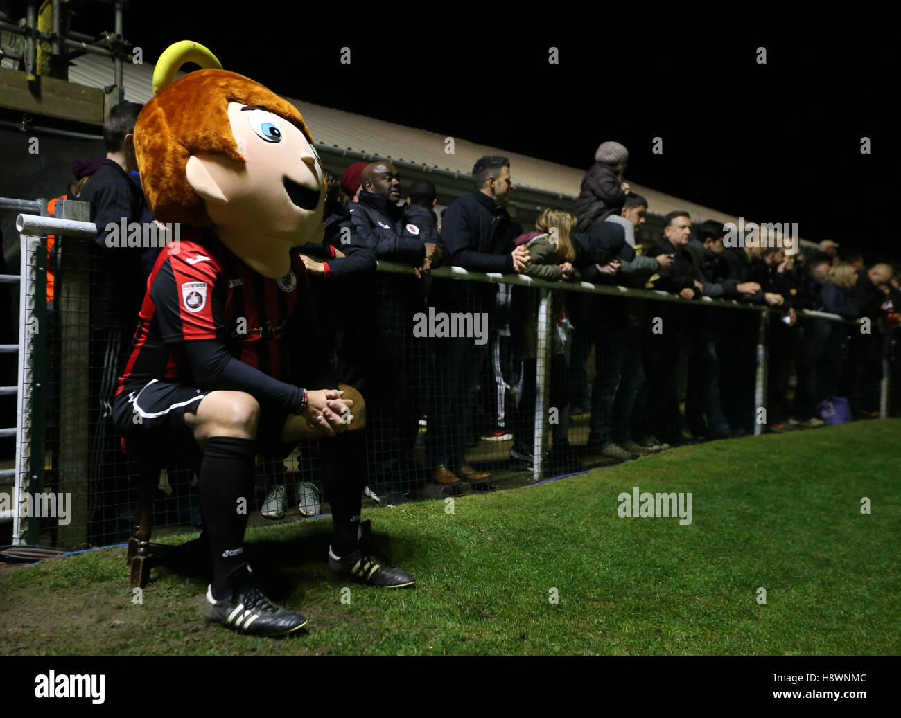 Brackley Town mascot Sammy The Saint watches the FA Cup First Round Replay at St James Park, Brackley. Stock Photo