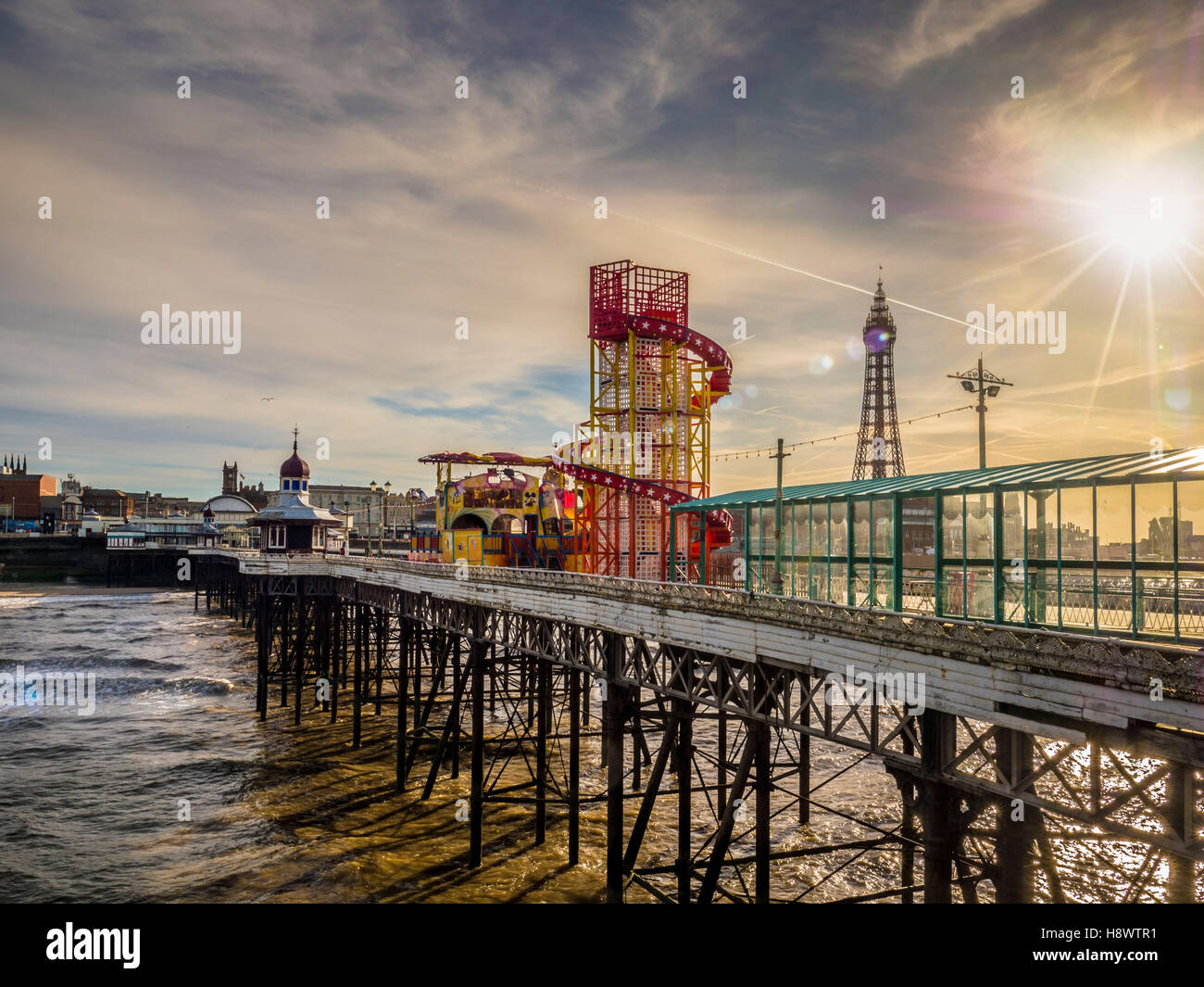 Helter Skelter on North Pier with Tower in distance, Blackpool, Lancashire, UK. Stock Photo