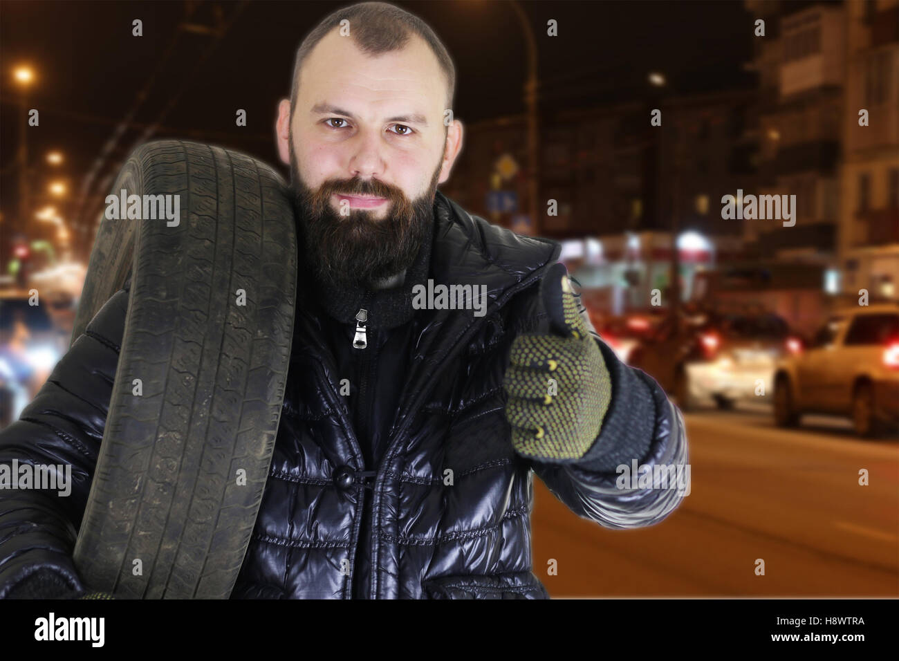 man changing tire wheels winter Stock Photo Alamy