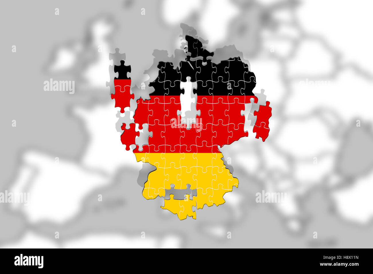 Germany disintegrate in Europe, Puzzle with national flag Stock Photo
