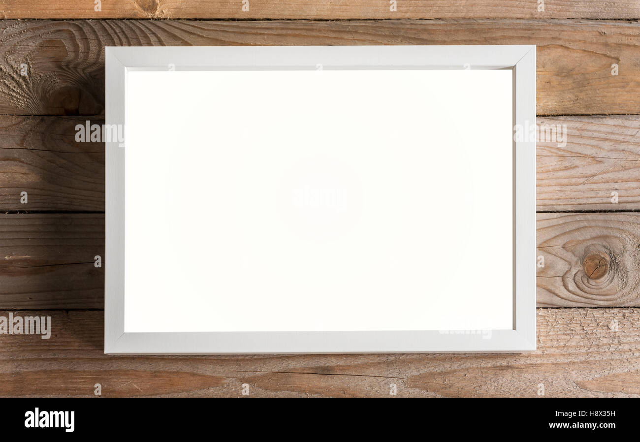 Image of white mockup frame on wooden background Stock Photo - Alamy
