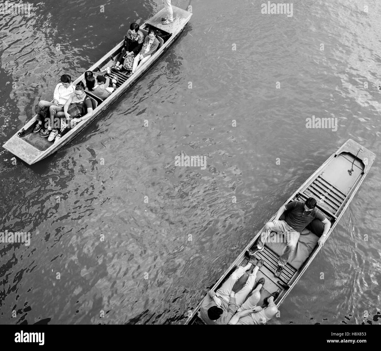 Cambridge punting black and white long exposure bridge rest tourist tourism travel boats boat river Cam Stock Photo