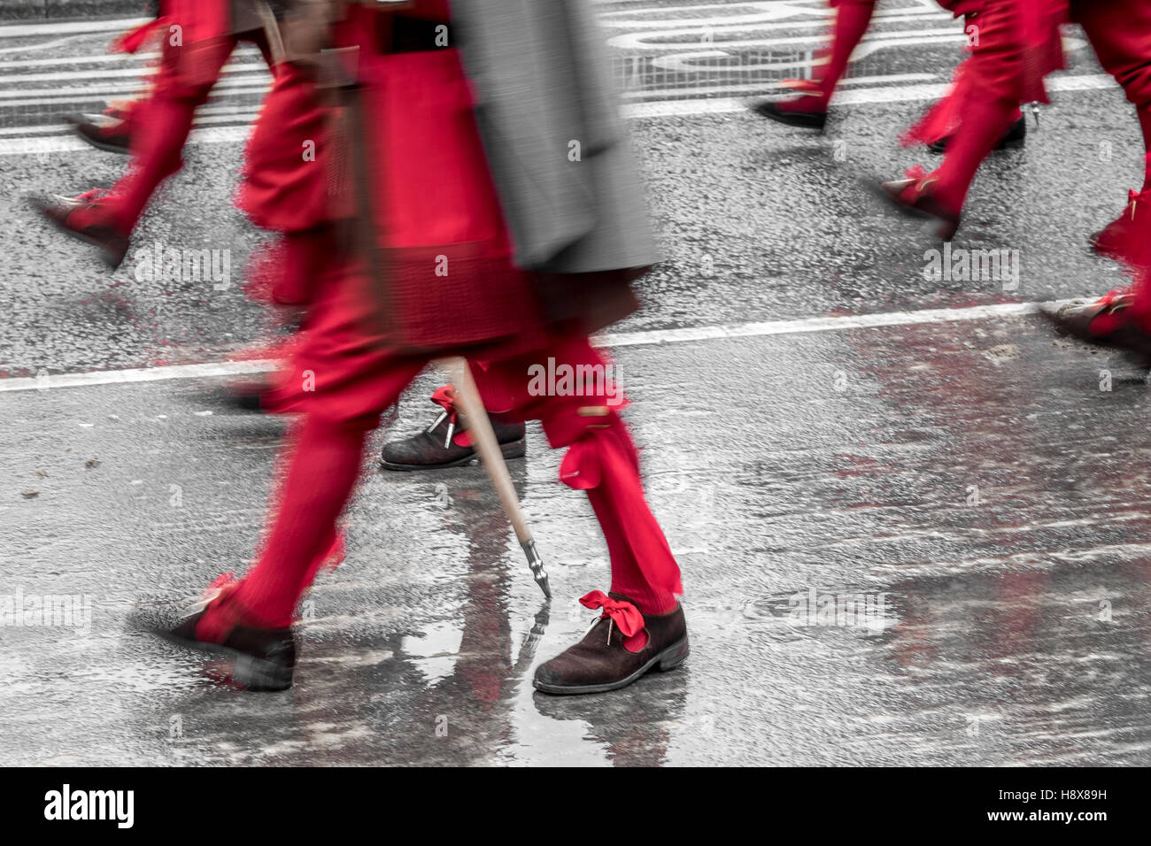 Men march in Lord Mayor's show in London, England November 2016.  Red stockings buckle shoes royalty royal soldier Stock Photo
