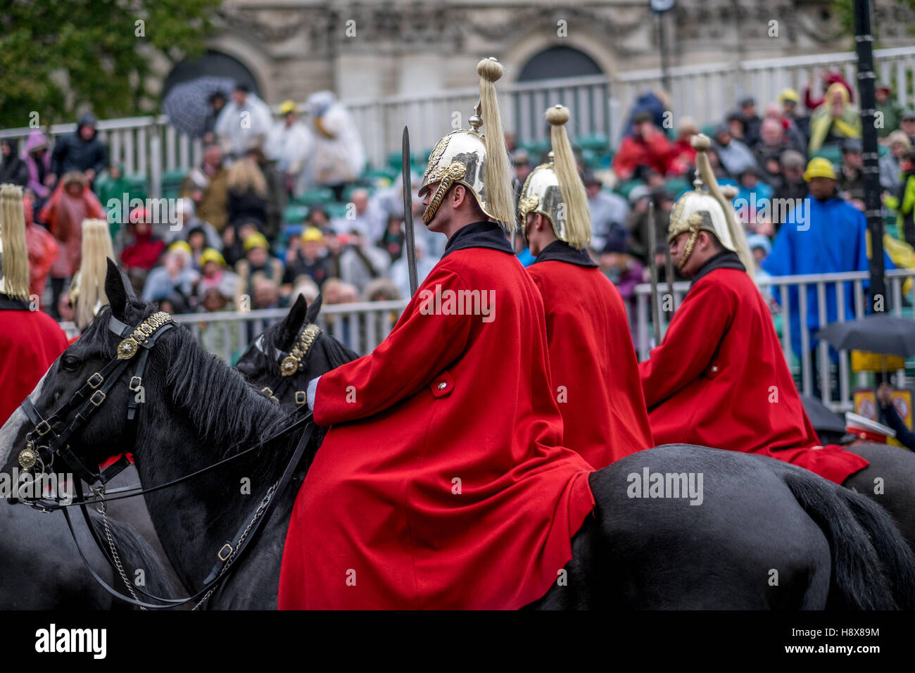 Lord Mayor's Show in London England November 2016 show's men on horseback with gold helmet wearing red cloaks.  Royalty. Stock Photo