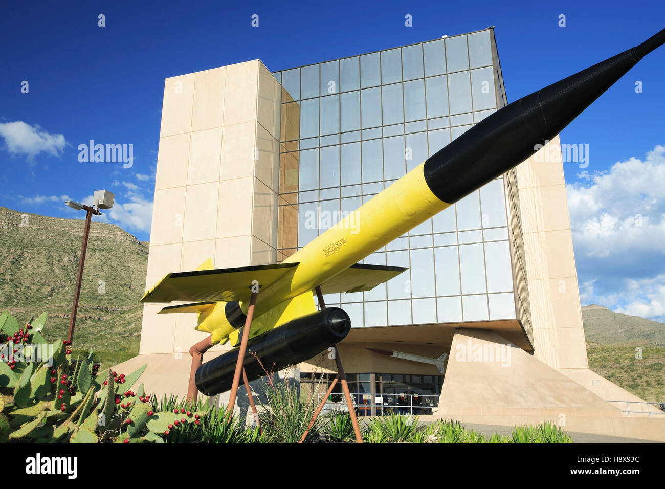 Yellow rocket and New Mexico Museum of Space History, Alamogordo, New Mexico USA Stock Photo