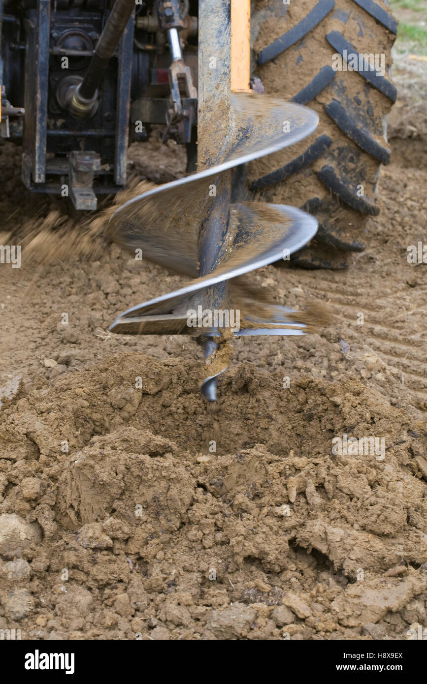 Drilling Rig Boring Hole in Clay Soil at Construction Site Stock Photo