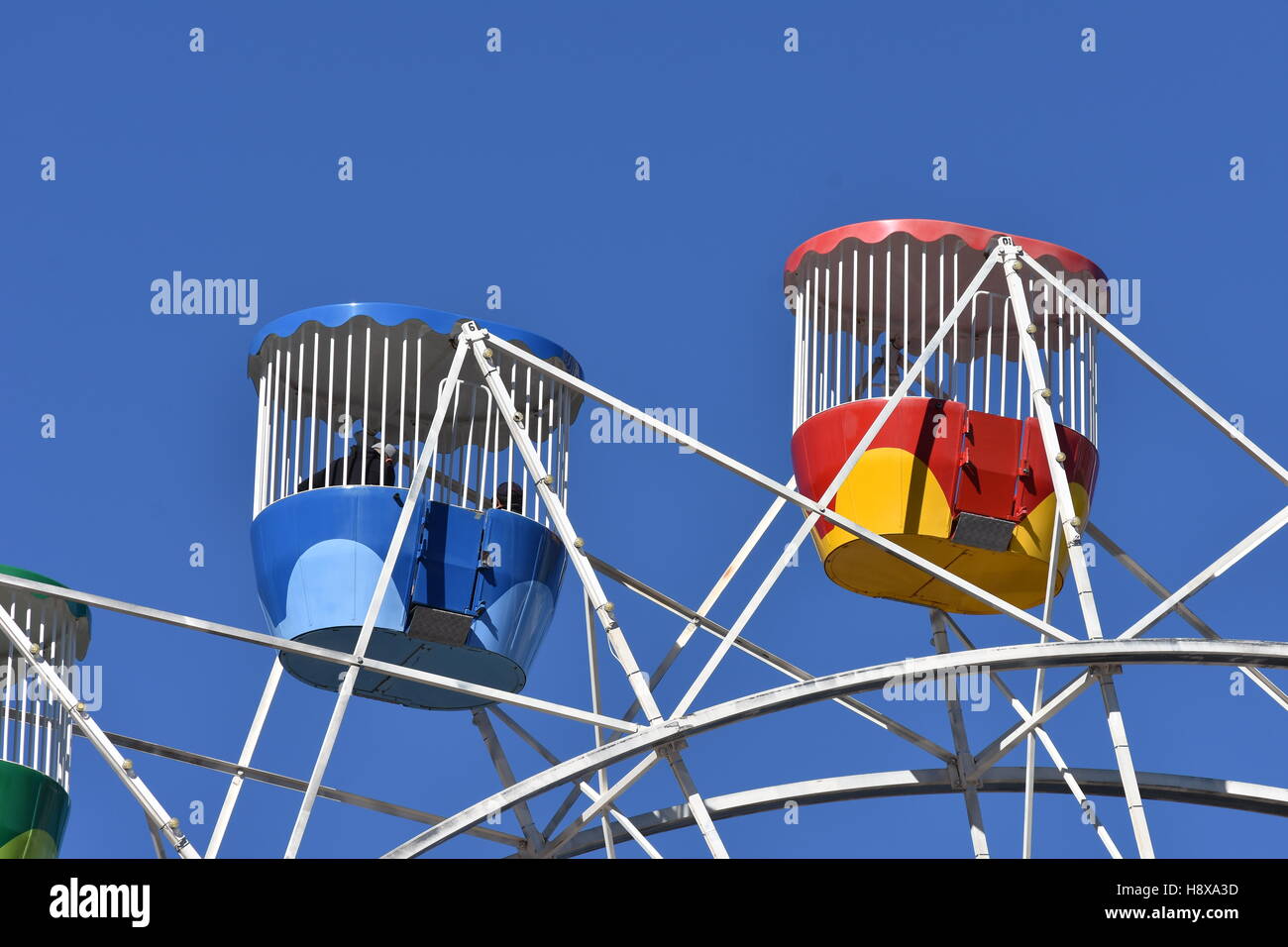 Details of ferris wheel against blue sky background on sunny day Stock ...