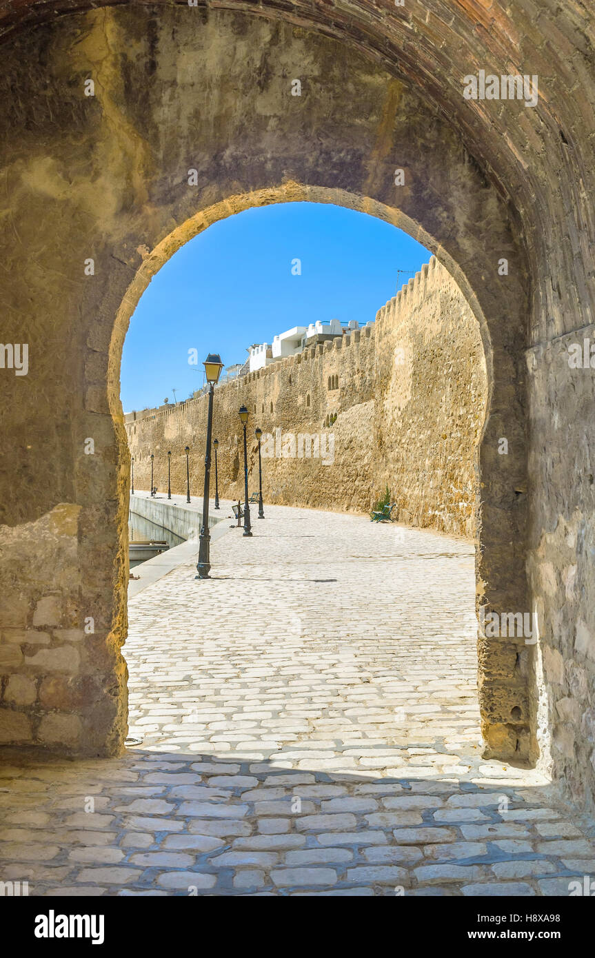 The stone arch was the entrance to the old port in the middle ages, Bizerte, Tunisia. Stock Photo