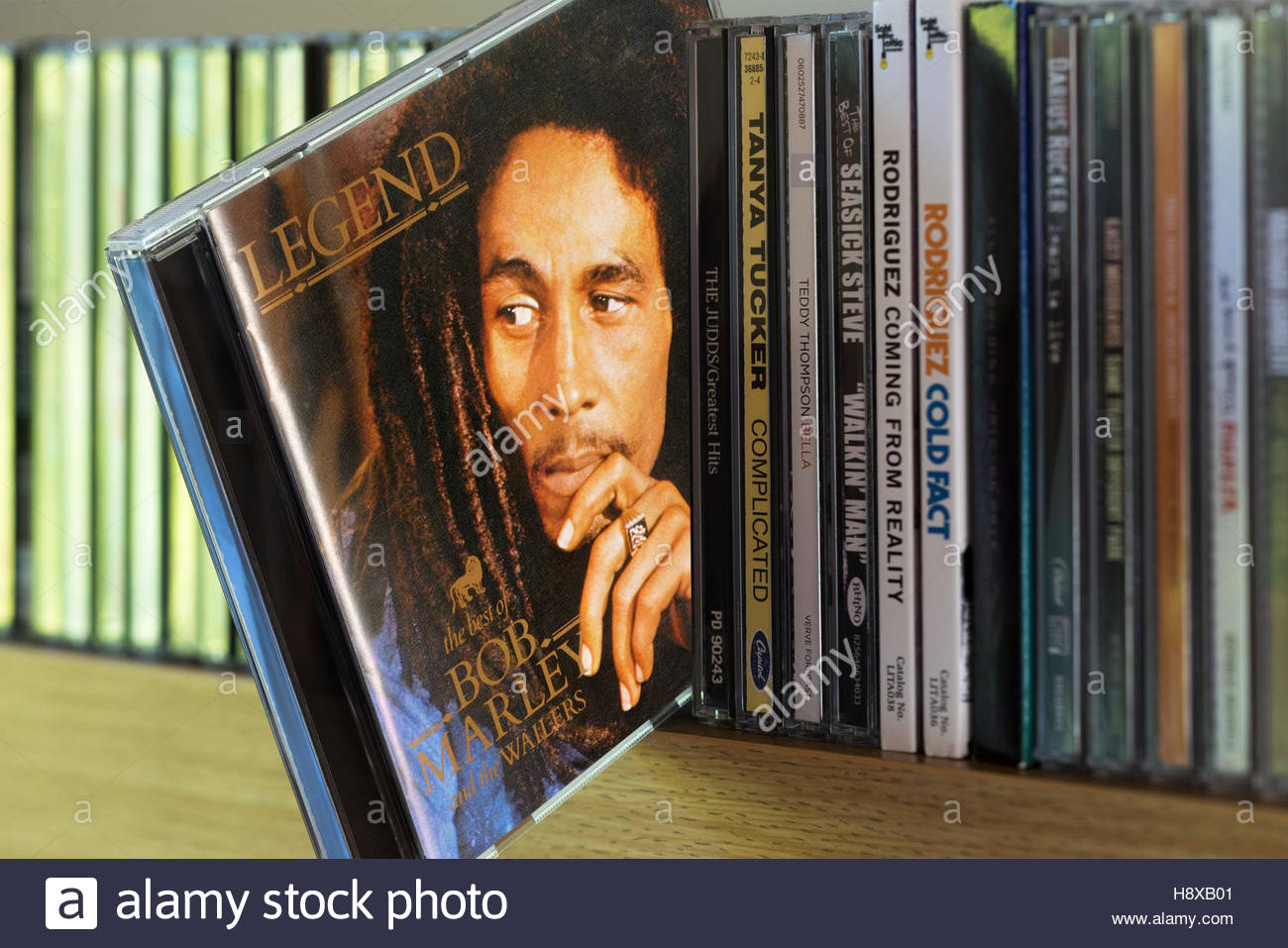 Legend Bob Marley Cd Pulled Out From Among Other Cds On A - 