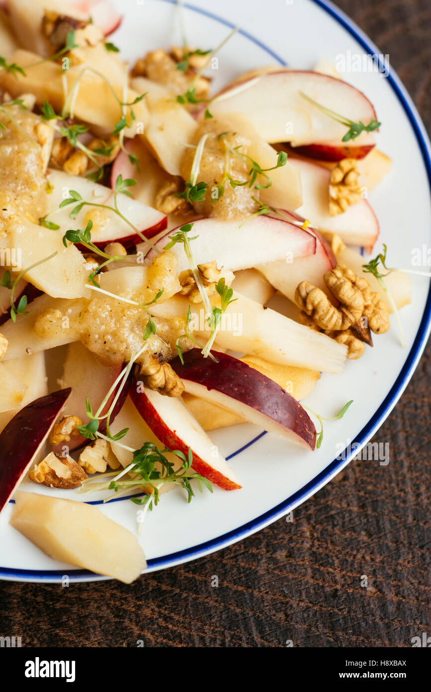 Black Salsify, Apple Salad with Walnuts and Quince Dressing Stock Photo Alamy