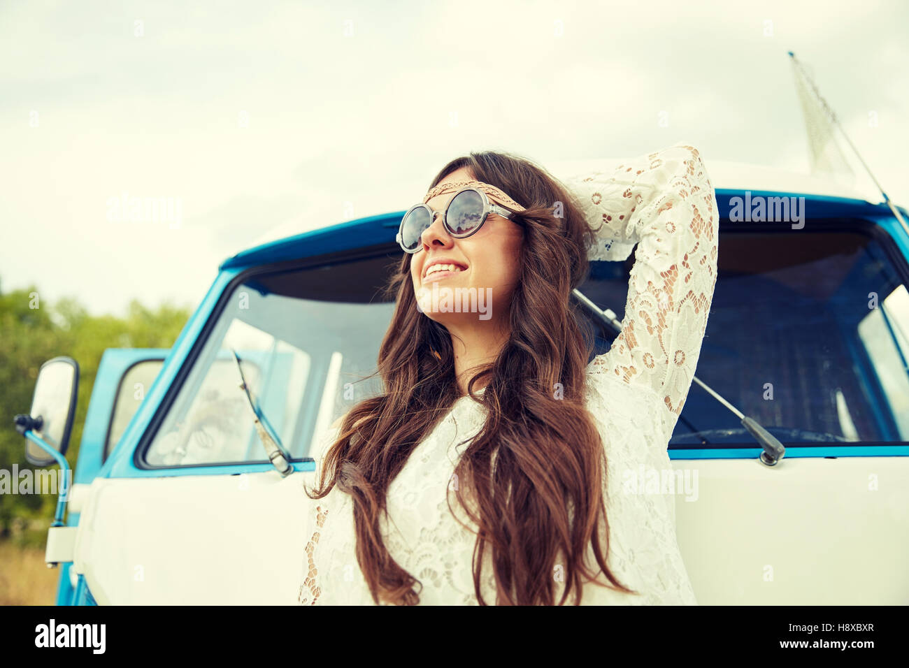 Hippy woman in sunglasses hi-res stock photography and images