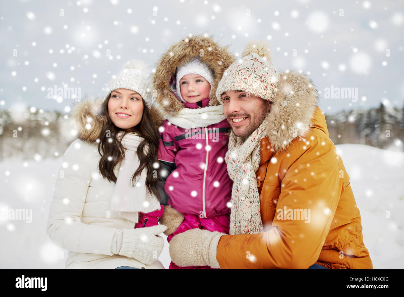 happy family with child in winter clothes outdoors Stock Photo - Alamy