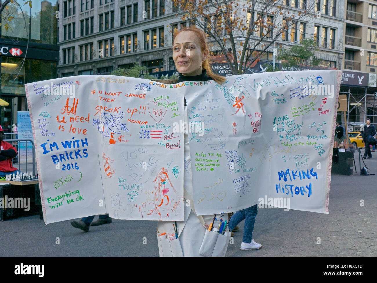 Performance artist Mirena Rhee invited people to write on her canvas ...