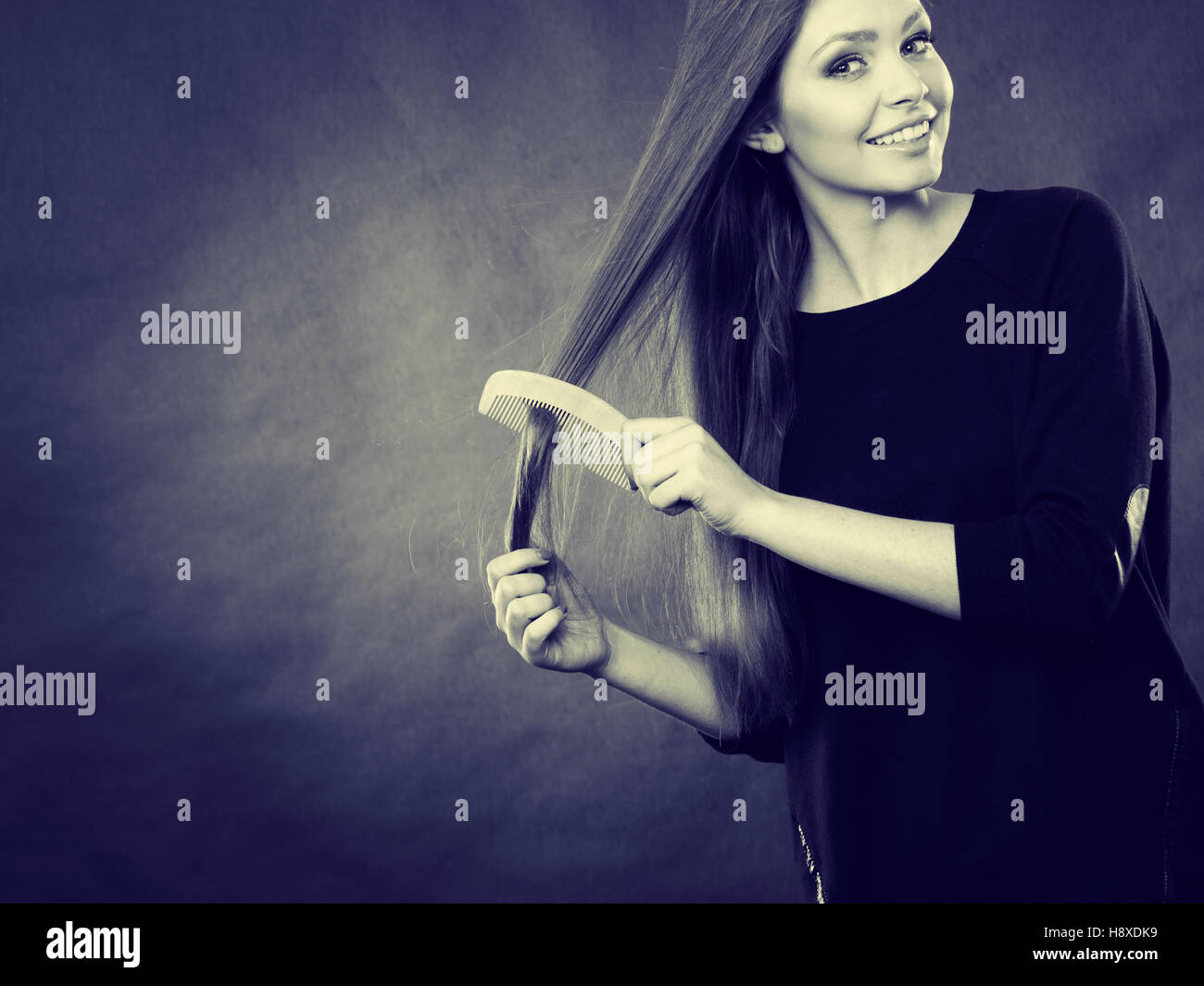 Healthy Look Concept Girl Combing Brushing Her Hair By Using