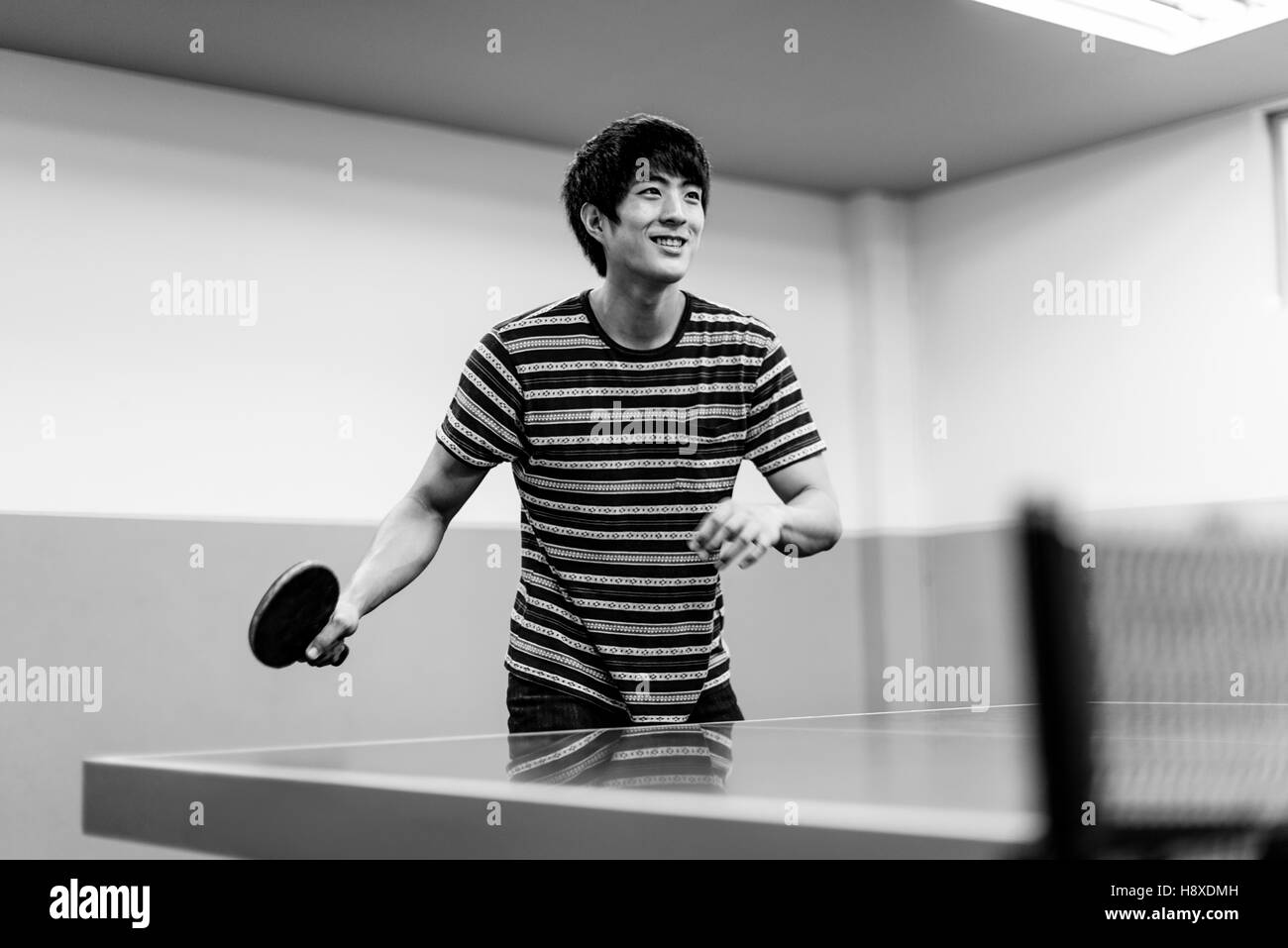 Asian male tennis player Black and White Stock Photos & Images - Alamy