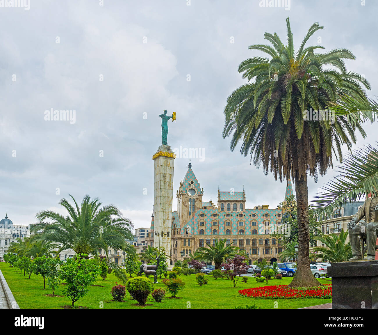 The statue of Medea with the golden fleece among the palm trees in the Europe Square of Batumi, Georgia. Stock Photo