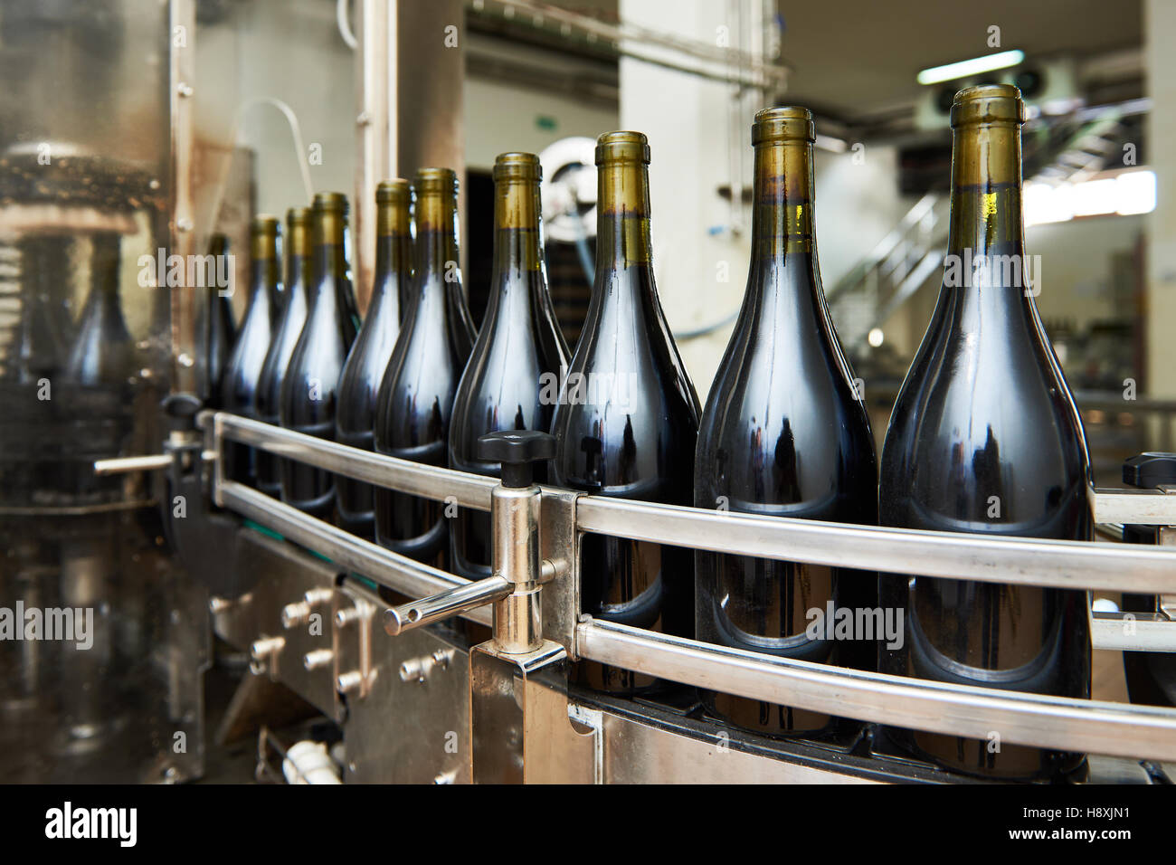 Bottling and sealing conveyor line at winery factory Stock Photo Alamy