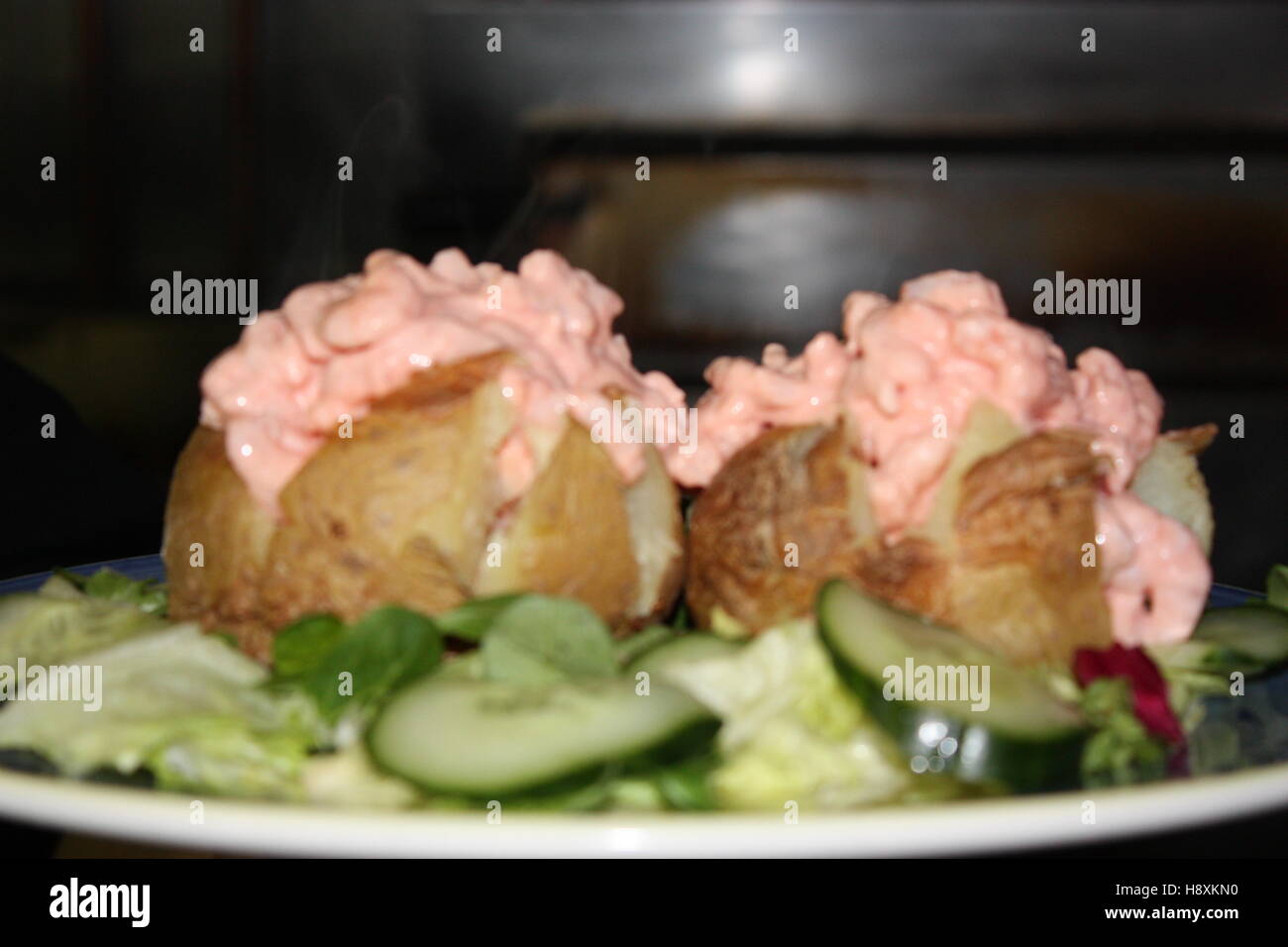 prawn cocktail jacket potatoes and salad Stock Photo Alamy