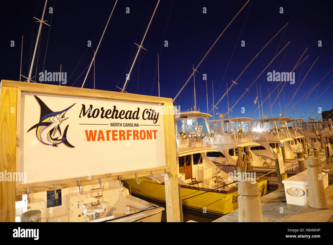 Sportfishing boats on the waterfront at dusk, Morehead City, North Carolina, USA Stock Photo