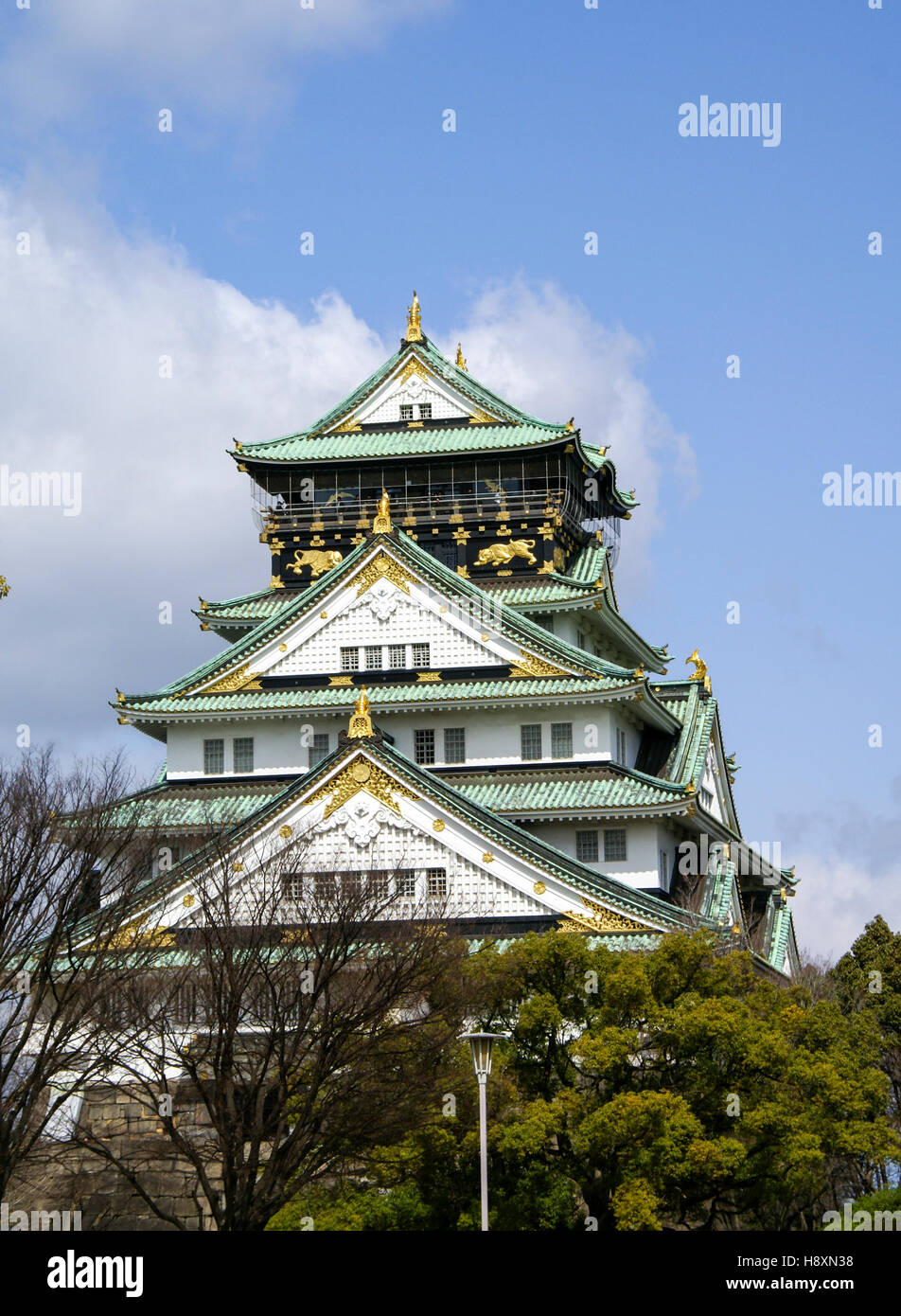 Osaka Castle is a Japanese castle in Chūō-ku, Osaka, Japan. It was built in the sixteenth century and is surrounded by a moat. Stock Photo