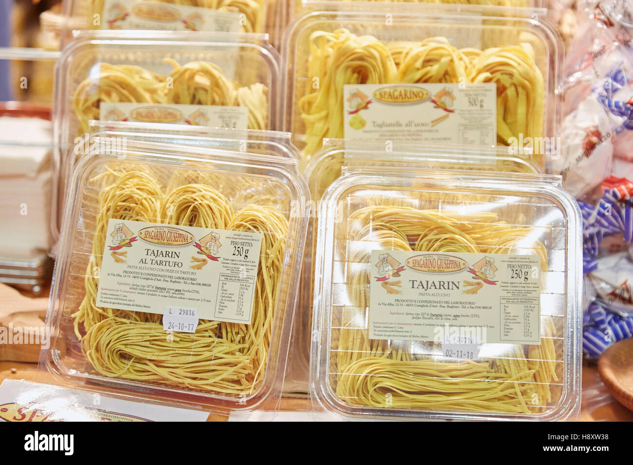 Tajarin fresh truffle flavored pasta on sale during Alba White Truffle Fair in Alba, Italy Stock Photo