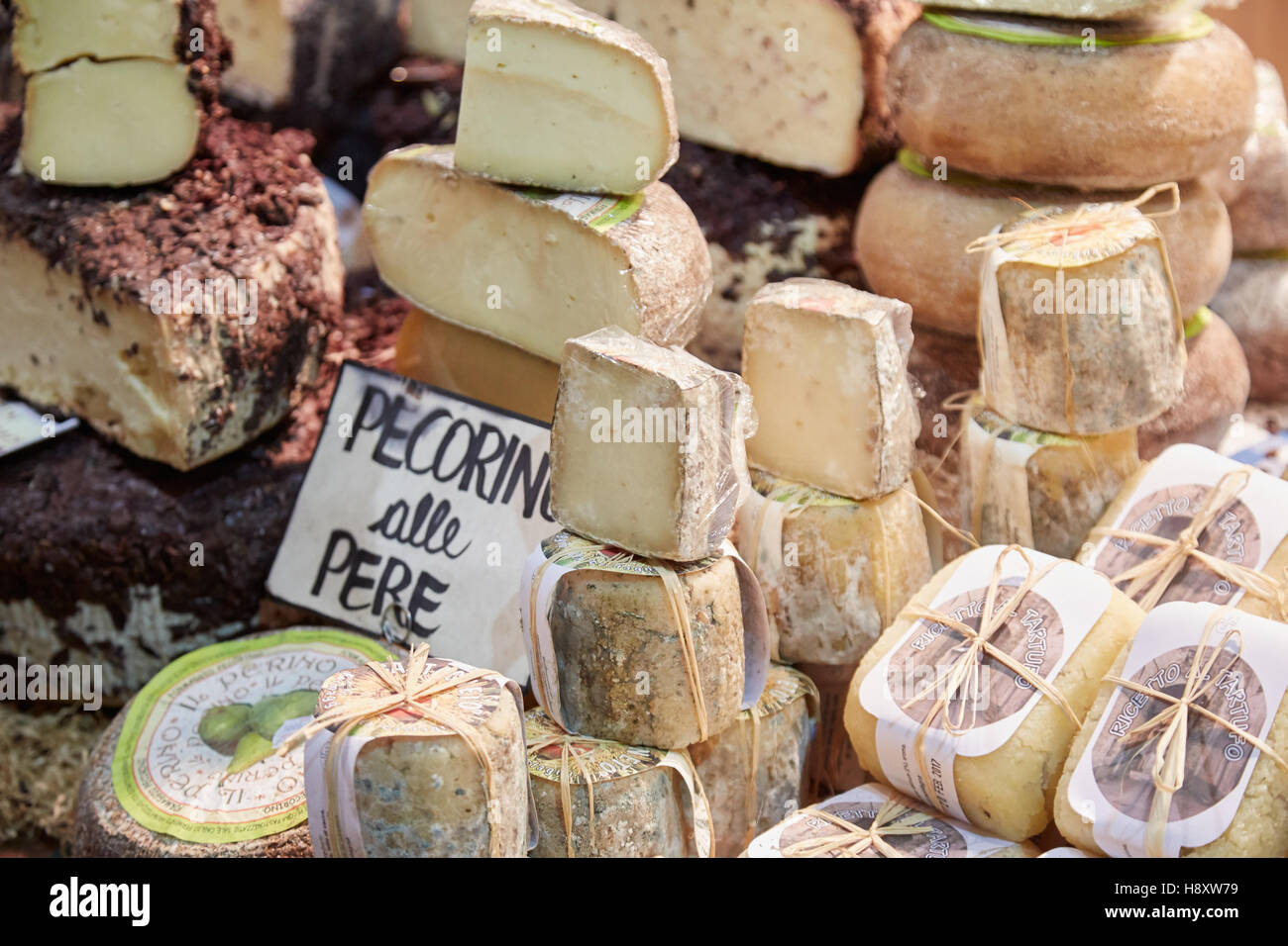 Typical cheese on sale during Alba White Truffle Fair in Alba, Italy