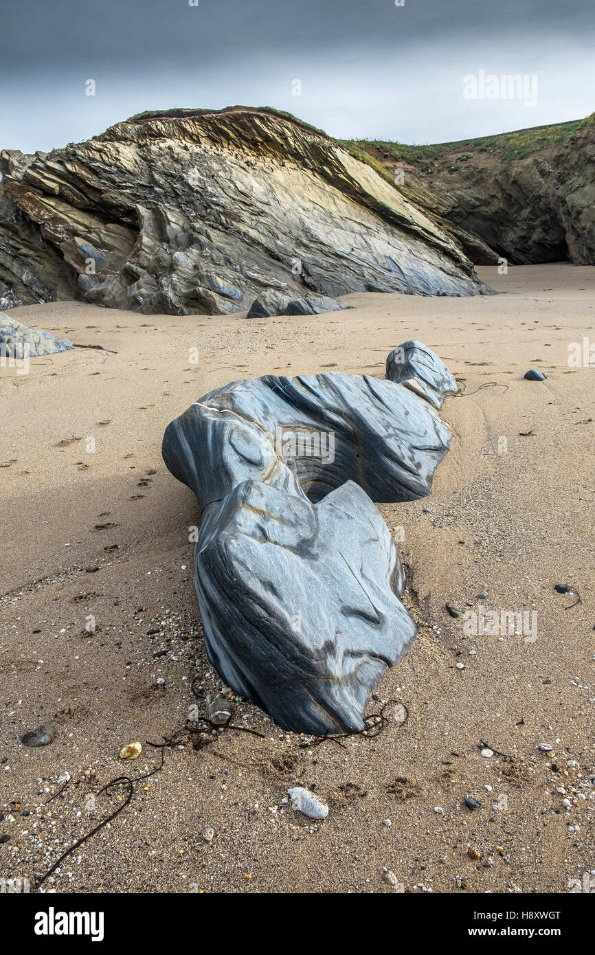 Rocks exposed at low tide on Little Fistral Beach in Newquay, Cornwall. Stock Photo