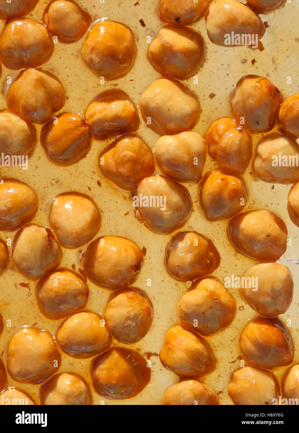Brown nougat or nougatine with whole roasted hazelnuts Stock Photo Alamy