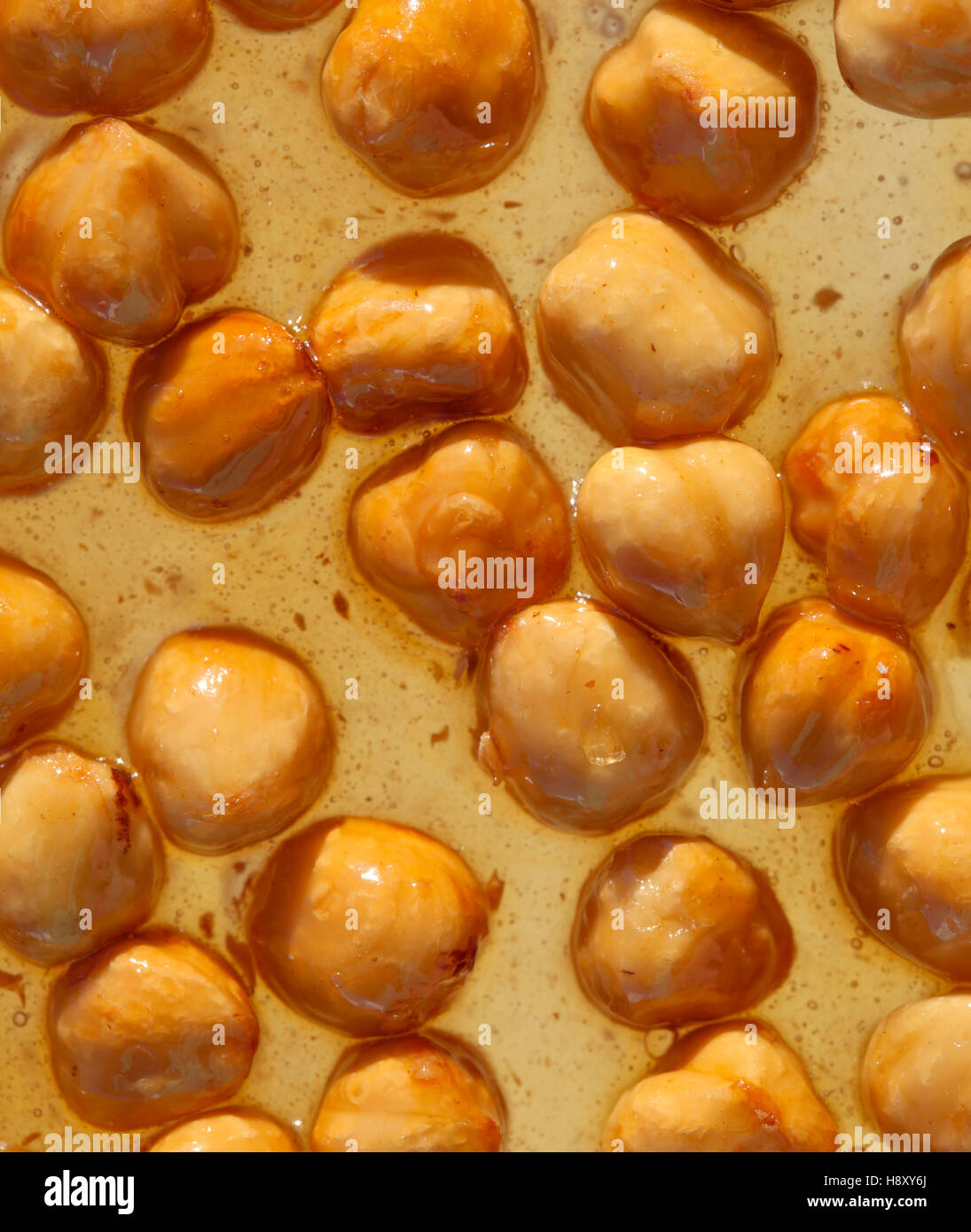 Brown nougat or nougatine with whole roasted hazelnuts Stock Photo Alamy