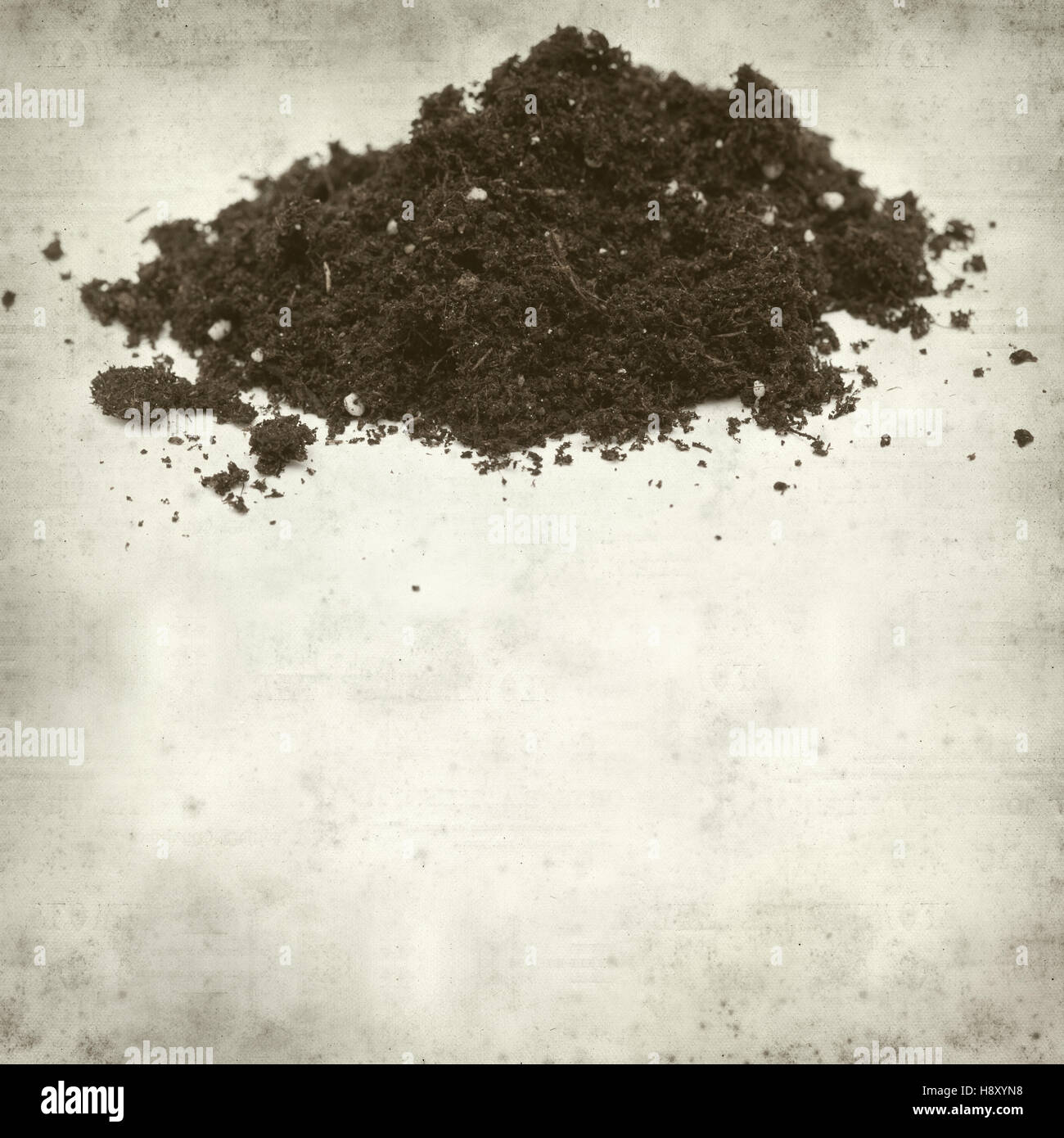 textured old paper background with small heap of compost Stock Photo ...