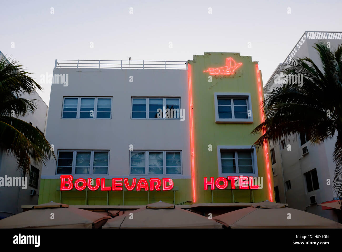 Art deco hotels at night with neon lights along Ocean Drive in the Art