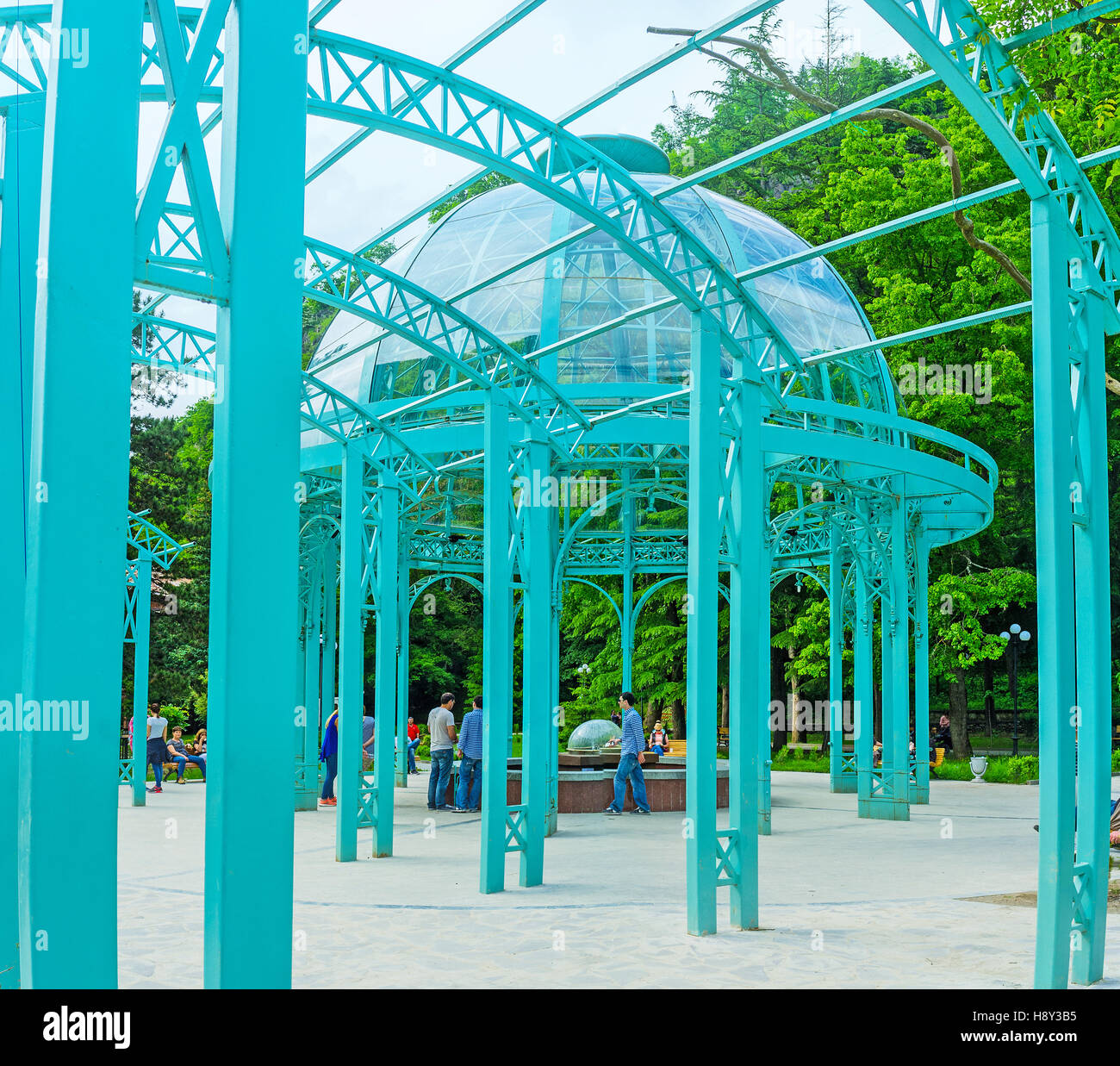 The bright blue pavilion with the hot source in Mineral Water Park Stock Photo