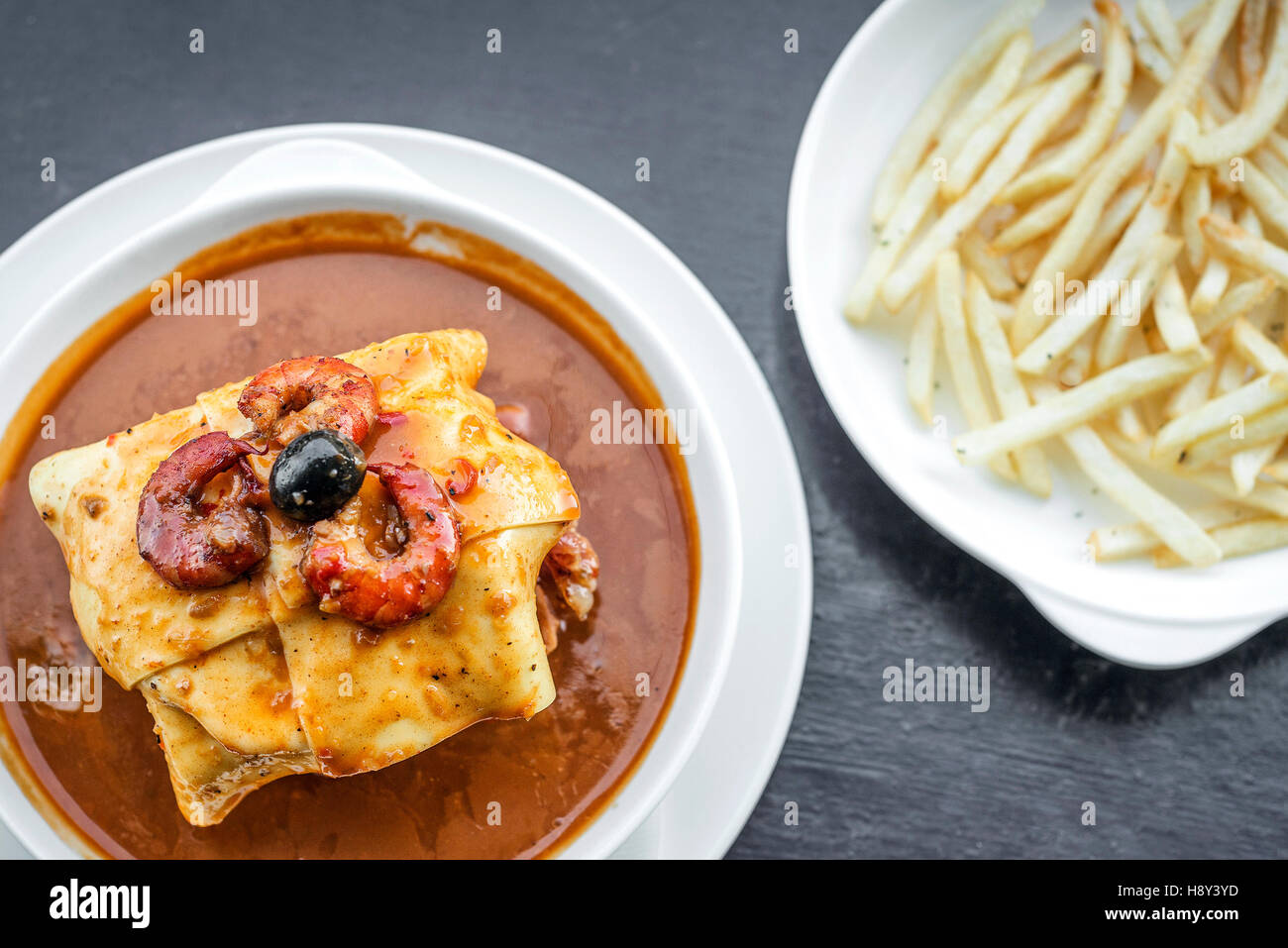 famous francesinha traditional meat cheese and spicy sauce grilled