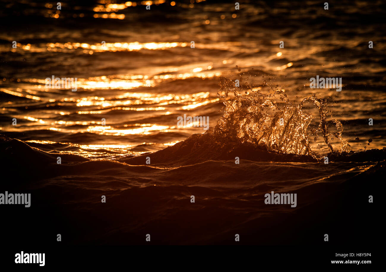 Sunset water waves hi-res stock photography and images - Alamy