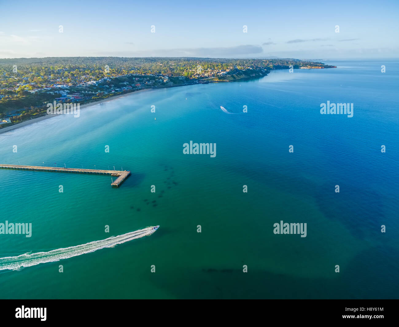 Aerial view of Frankston Pier in turquoise bay waters of Mornington