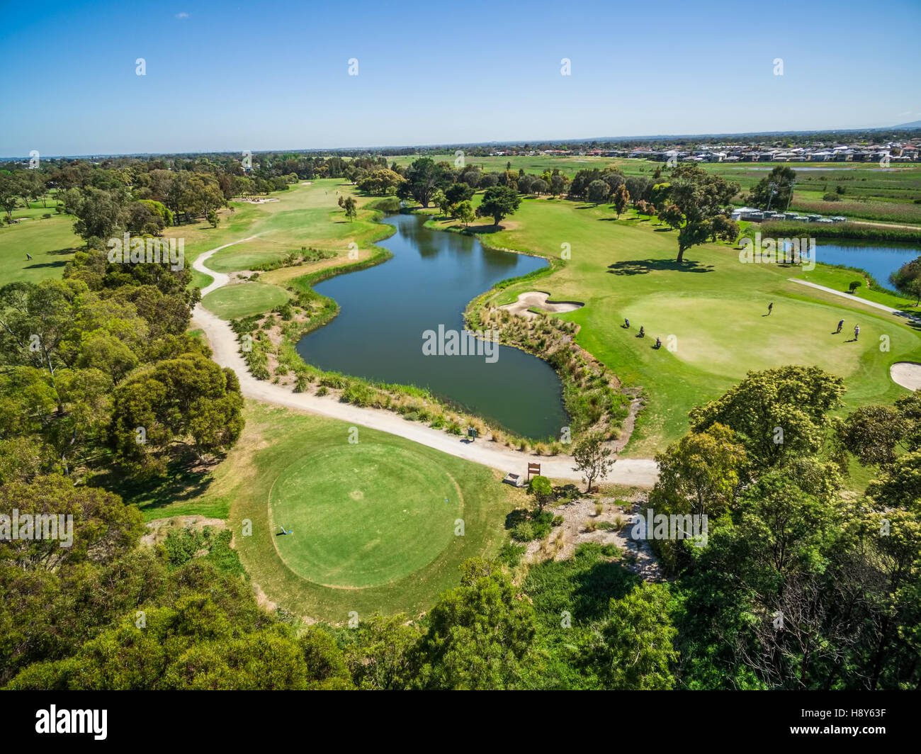 Aerial view of Patterson River Golf Club and golfers on a bright sunny day. Melbourne, Australia. Stock Photo