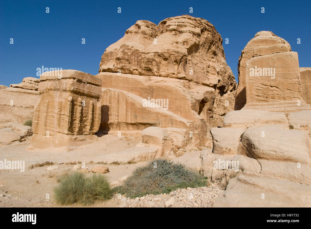 Rock cut tombs at the entrance to ancient Nabatean city of Petra ...