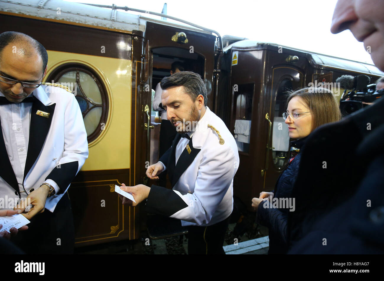 Commuters board a vintage Belmond British Pullman train at Ashford International station in Kent for a surprise journey to London. Stock Photo
