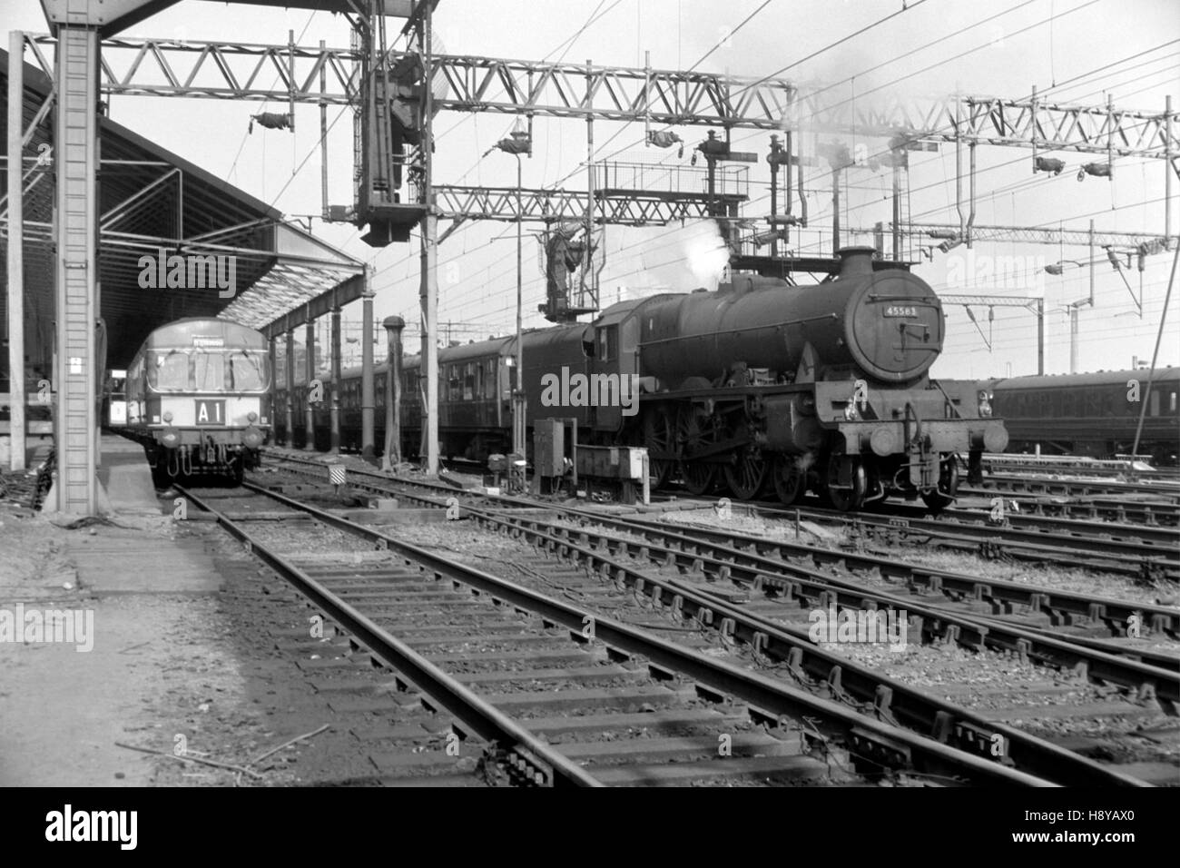 an original british rail stanier class 5 steam locomotive number 45583 assam in the 1960s  rugby midland station england uk Stock Photo