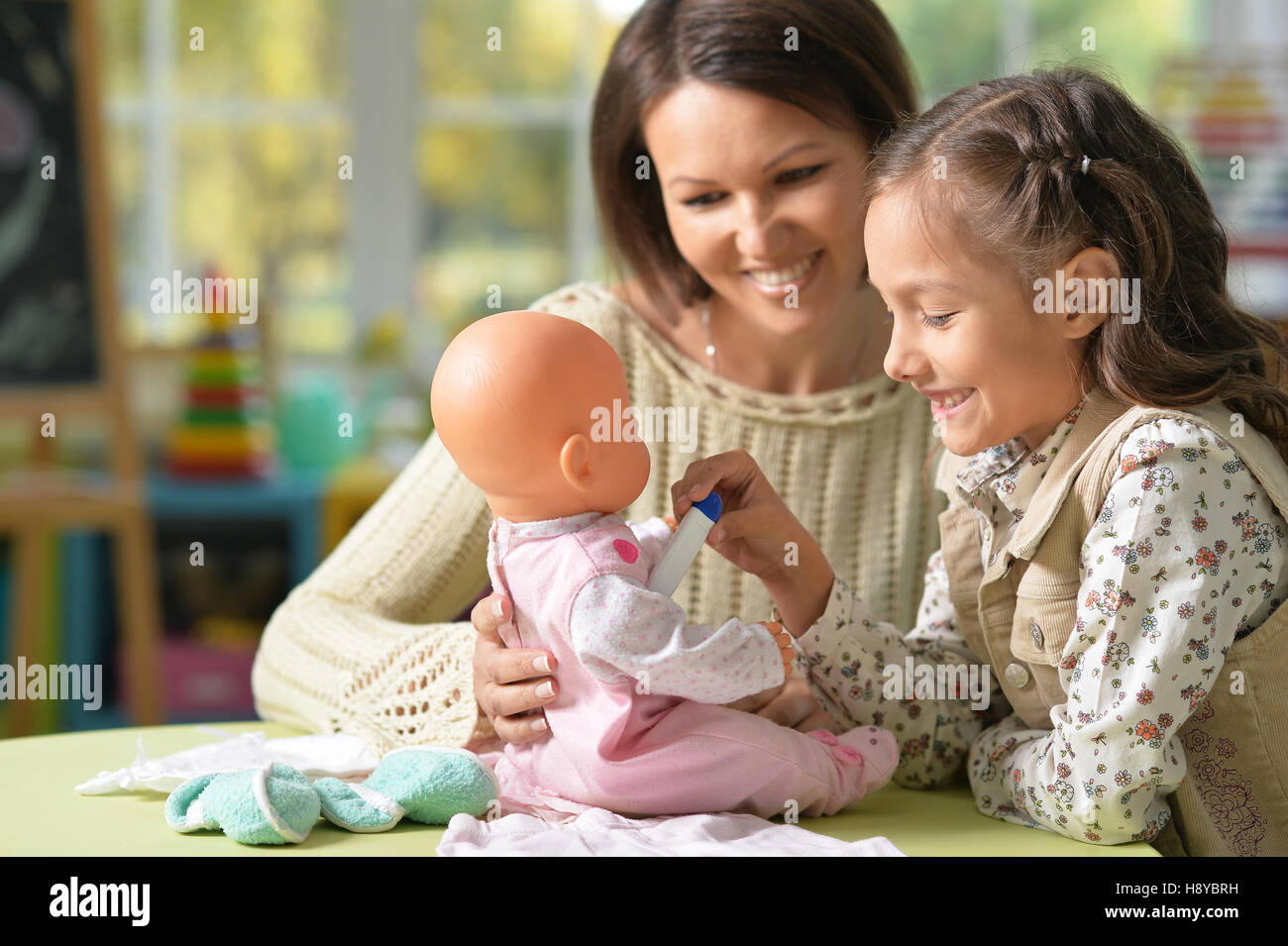 Mother and daughter play Stock Photo