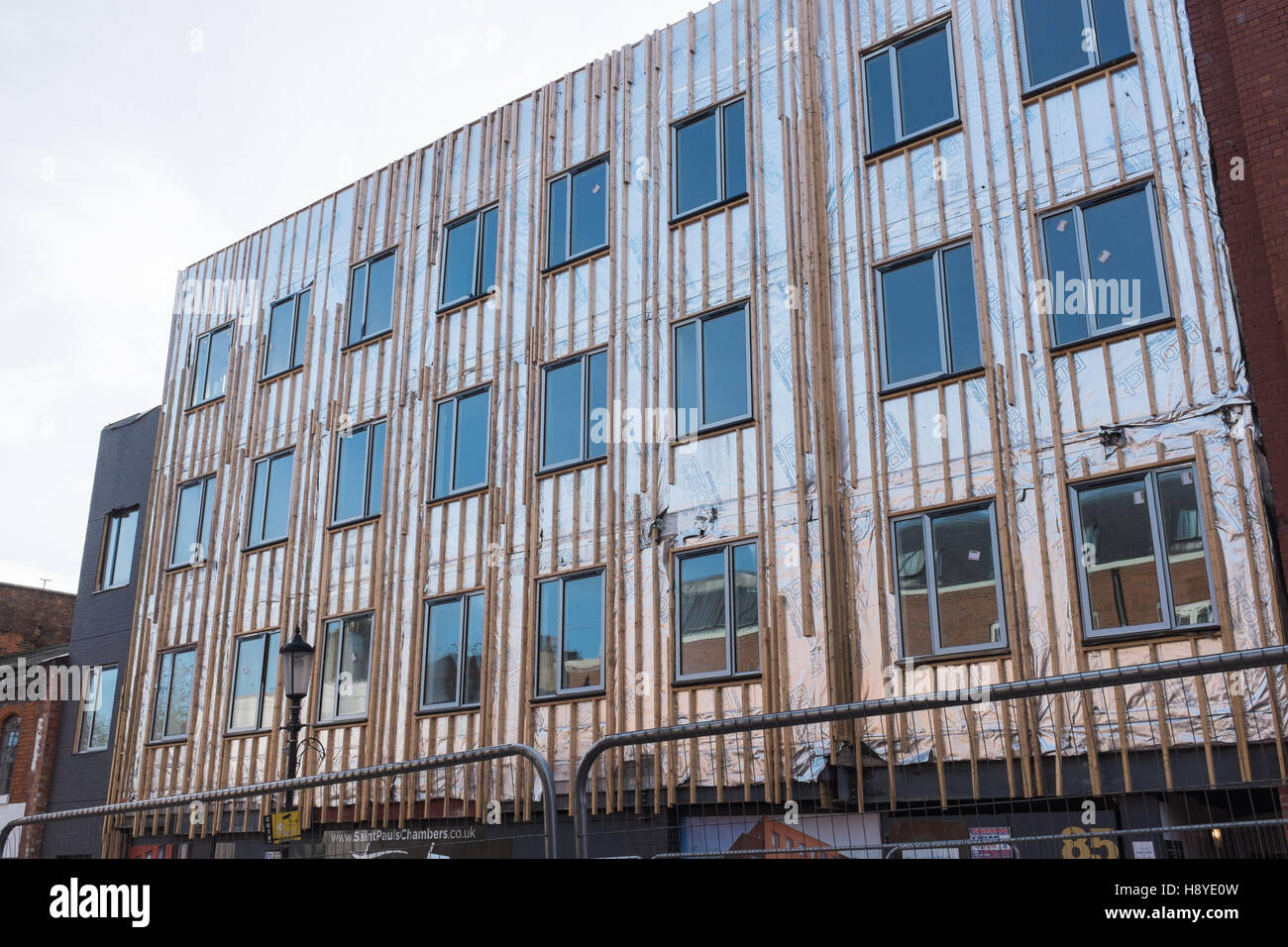 A new building with the insulation panels visible before cladding is fixed Stock Photo