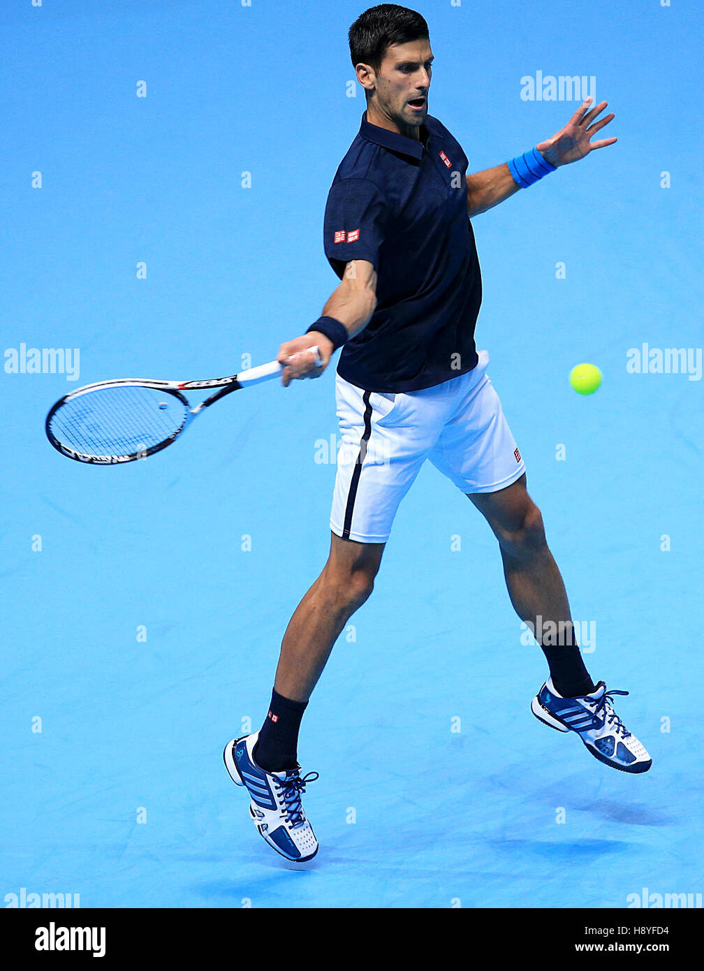 Novak Djokovic in action against David Goffin during day five of the Barclays ATP World Tour Finals at The O2, London. Stock Photo