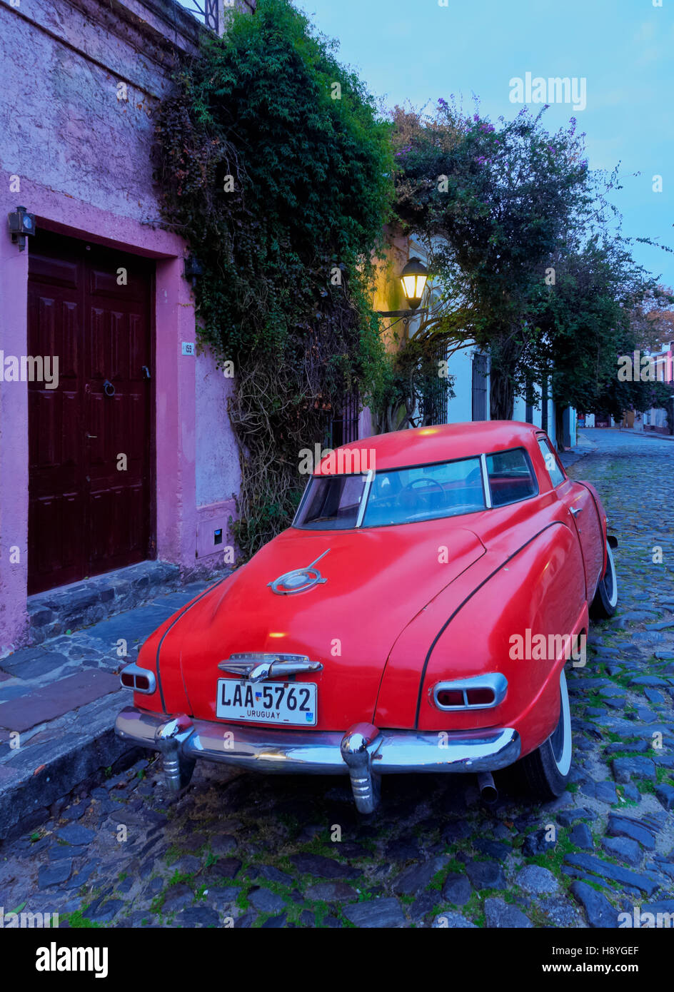 Uruguay, Colonia Department, Colonia del Sacramento, Vintage Studebaker car on the cobblestone lane of the historic quarter. Stock Photo