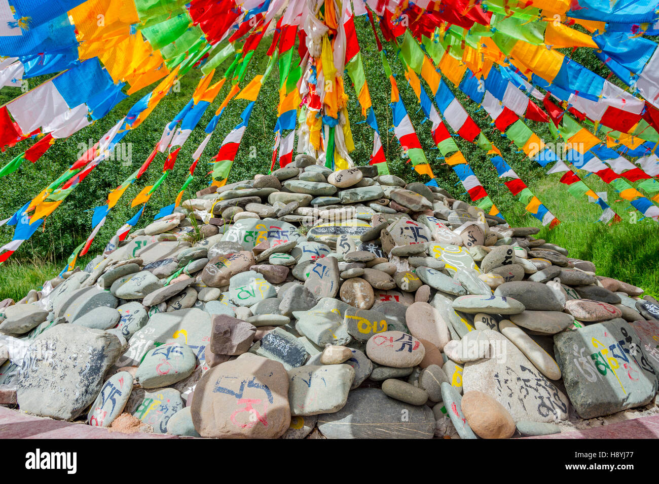 Mati Si cave temple with colorful praying buddhist flags, Zhangye, Gansu province, China Stock Photo