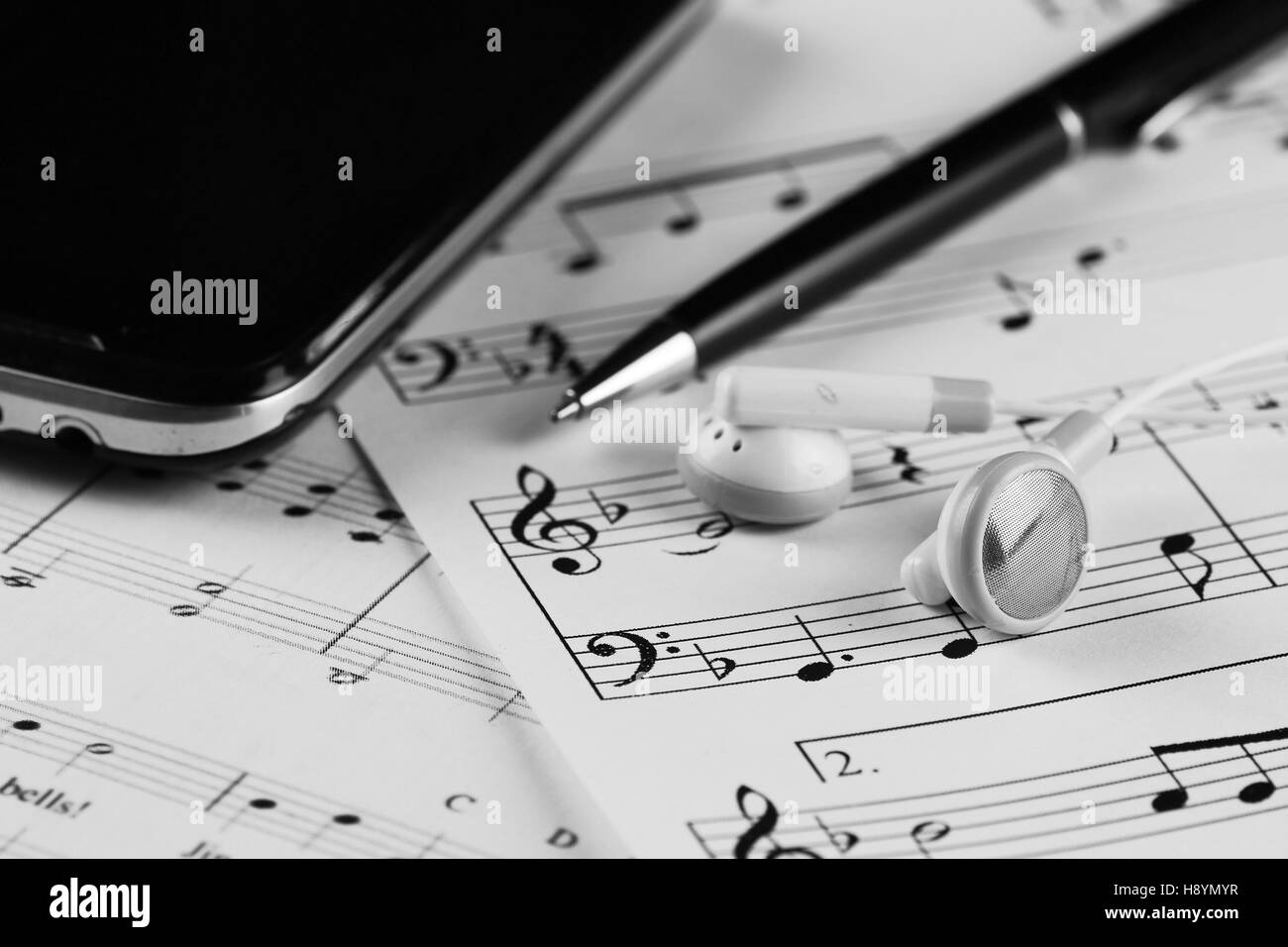 Sheet music with a number of accessories Stock Photo Alamy